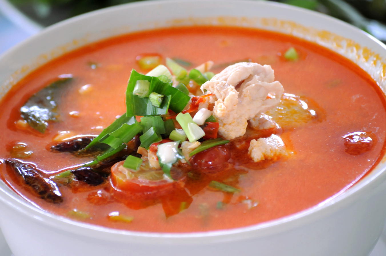 A restaurant-prepared tom yum gai with chicken