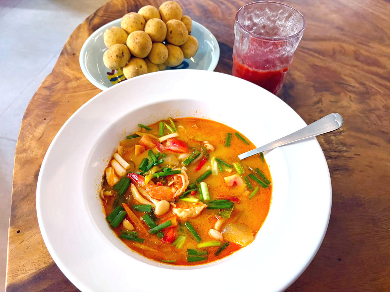 Tom yum kung with shrimp and coconut milk at a Thai restaurant on Koh Samui